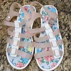Call it spring jelly sandals new size 38 , they fit like a 6